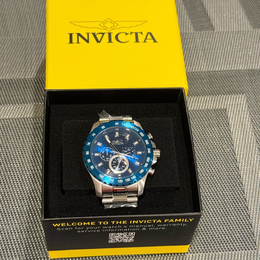 Invicta Silver Watch with Vibrant Blue Dial